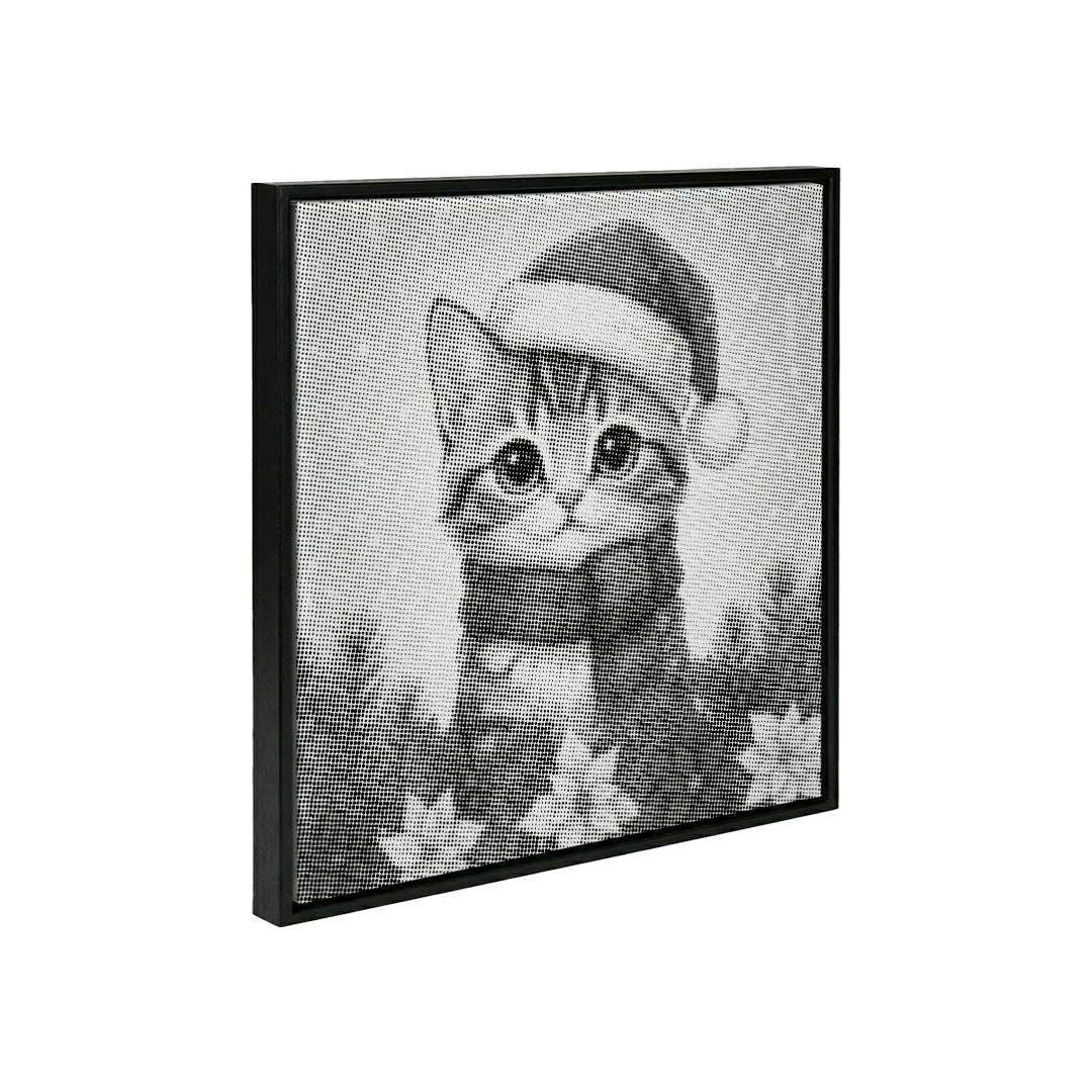 Chaton avec peinture à pois de chapeau de Père Noël